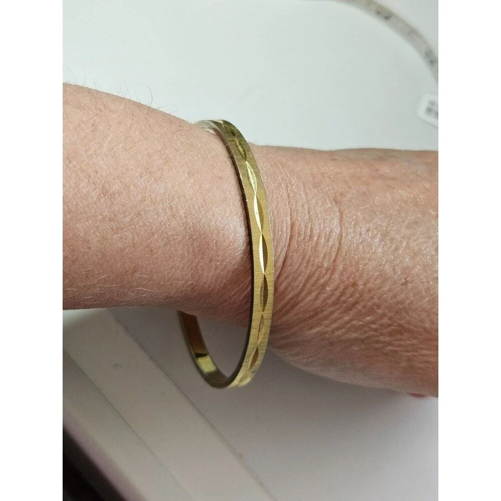 Monet gold tone diamond cut bangle bracelet 7.75